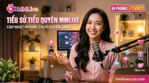 Banner tiểu sử Tiểu Quyên MMLive, cập nhật phong cách duyên dáng với ID phòng 774921. Hình ảnh nữ streamer xinh đẹp mỉm cười rạng rỡ đang ngồi trước micro trong không gian phòng live ấm áp, kèm các biểu tượng tương tác ảo và tên miền mmlive.cn.com.